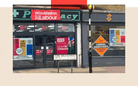 Labour and Lib Dem offices next to each other - with rival bar charts