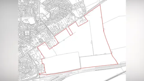 Gladman Developments A map of the proposed development site, showing an aerial view of the land north of Wymondham outlined in a red marker. 