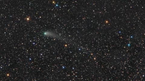 A comet in the night sky