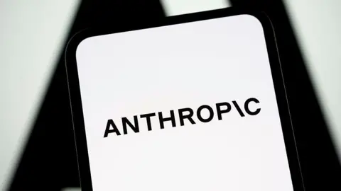 Getty Images Black and white Anthropic logo displayed on a smartphone screen.