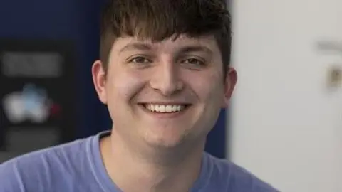 Deio Owen National Union of Students for Wales president Deio Owen in a T-shirt smiling