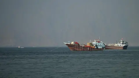 Two vessels at the Strait of Hormuz, taken from Musandam, Oman