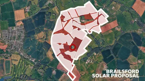Map showing James' home ringed with a red circle with white areas showing where solar panels would be