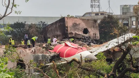 A picture of the crash site of the Air India plane