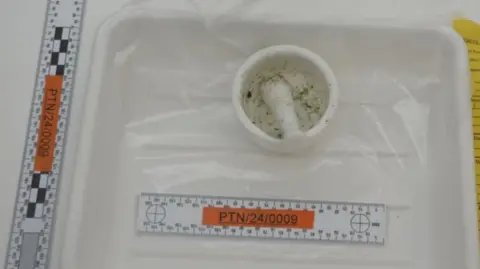 Merseyside Police A picture of a pestle and mortar taken as part of police evidence