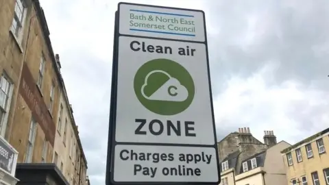BBC Bath and North East Somerset Council Clean Air Zone sign in a street in Bath