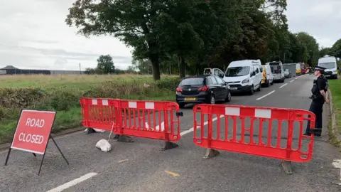 Police near Enstone crash scene