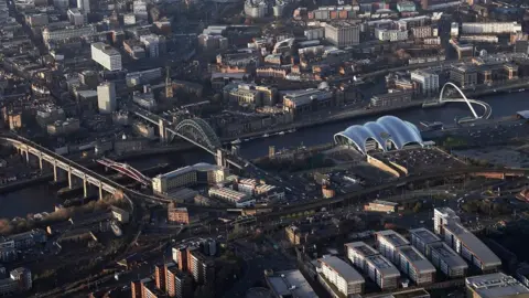 PA Media An aerial view of the bridges across the River Tyne.