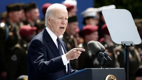 US President Joe Biden speaks at the D-Day commemoration ceremony in northern France. Photo: 6 June 2024