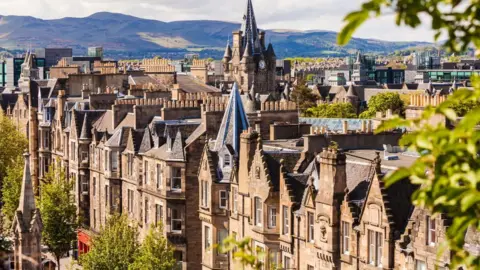 A general view of large stone house in Edinburgh on a sunny day 