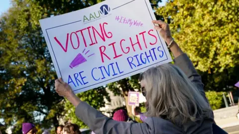 Reuters People protest on the day the US Supreme Court hears arguments regarding the composition of Louisiana electoral districts