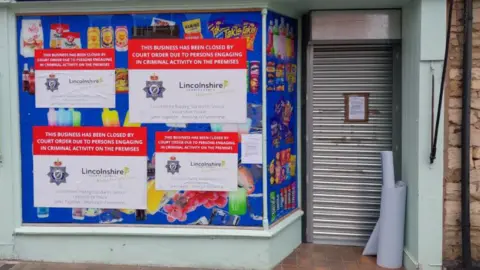 Lincolnshire Police A shop in Grantham that has been closed following a raid by police and Trading Standards officers
