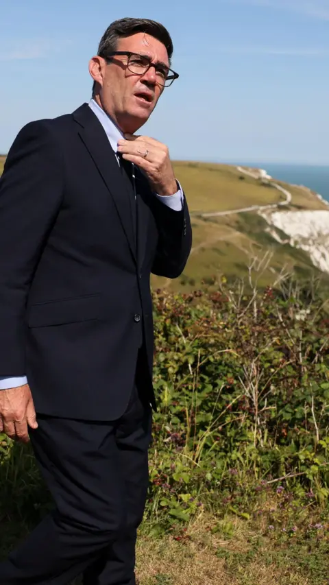 Andy Burnham on the White Cliffs of Dover.
