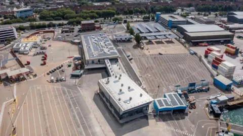 An aerial view of some of the large port buildings.