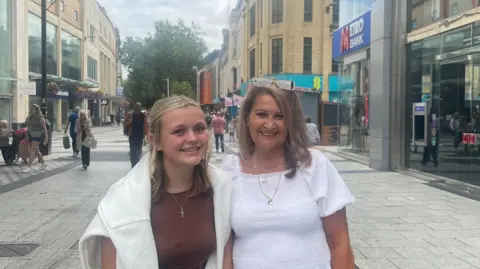 BBC News Kim Higgs and her granddaughter Caitlin Higgs shopping along Cardiff Queen Street