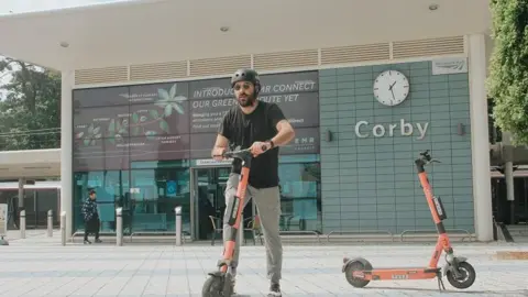 North Northamptonshire Council Man on e-scooter