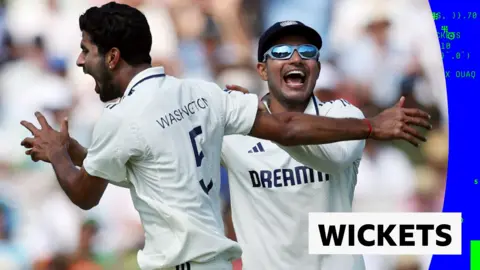 India's Washington Sundar celebrates with Shubman Gill