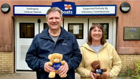 Allan and Helen Thornhill Allan and Helen Thornhill at Teddington RNLI, both are holding RNLI teddies