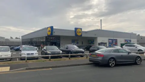 A general view of Lidl in Retford with several cars parked outside