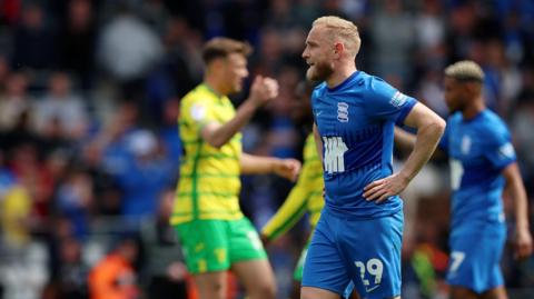 Alex Pritchard looks dejected after Birmingham City are relegated from the Championship