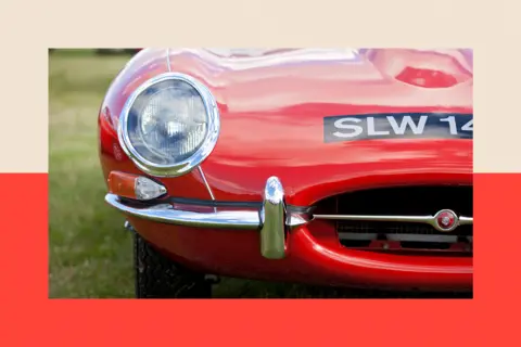 Getty Images A close-up view of a headlight of a Jaguar E Type classic car, pictured at Goodwood