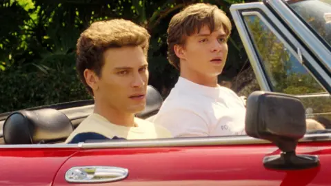 Netflix Cooper Koch (left) and Nicholas Chavez as Erik and Lyle Menendez 