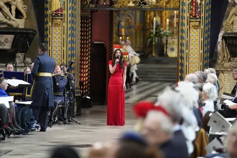 Jordan Pettitt/Pool via REUTERS Zizi Strallen sings during a service of thanksgiving at Westminster Abbey in London on the 80th anniversary of VE Day.
