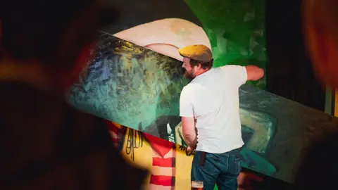 Jay Dawson Mac takes backdrop