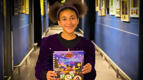 Magic Cat Publishing Nandi Bushell with her new book