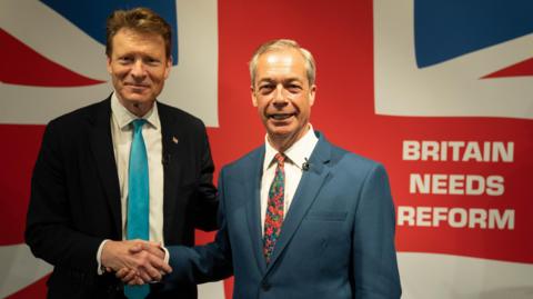 eader of Reform UK Richard Tice and Nigel Farage during a press conference to announce their party's legal immigration policy, at The Glaziers Hall in London, while on the General Election campaign trail. 