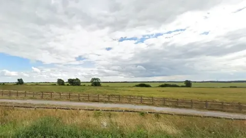 Google A Google Streetview picture of the current site with trees in an open field