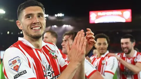 Ross Stewart claps supporters following their play-off triumph against Middlesbrough