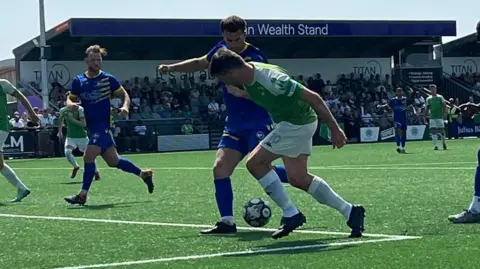Ross Allen in action for Guernsey FC