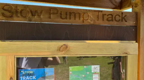 Wooden notification board with word stand pump track with word
