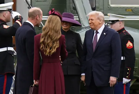 AARON CHOWN/POOL/AFP US President Donald Trump and First Lady Melania Trump are greeted by Britain's Prince William, Prince of Wales and Britain's Catherine, Princess of Wales, upon their arrival at the grounds of Windsor Castle, in Windsor, on September 17, 2025, for the start of a second State Visit.          