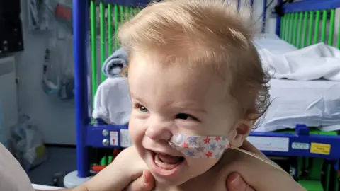 Family handout A smiling baby