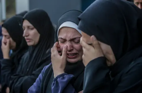 Palestinian women of the EPA mourn family members killed in an Israeli airstrike at the Al Aqsa Martyrs Hospital in the city of Deir Al Balah, in the middle of the Gaza Strip, on January 15, 2024.