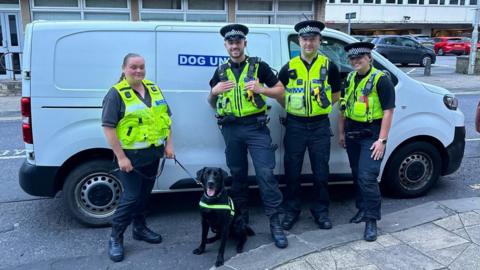 West Yorkshire Police officers with a drugs dog