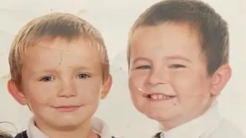 Tom Murray Rhys (left) and Tom (right) as children