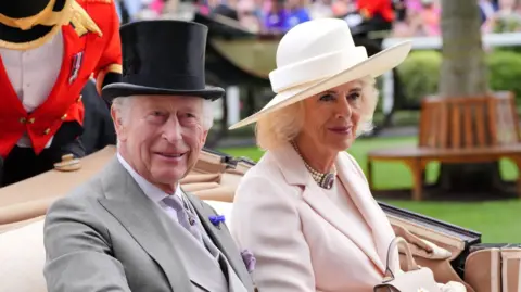 PA King Charles III and Queen Camilla