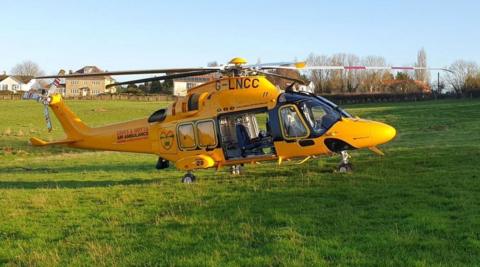 The air ambulance in a field 