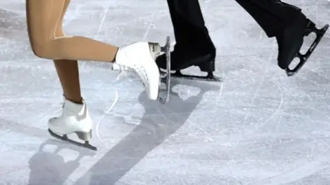 A generic view of figure skaters' boots