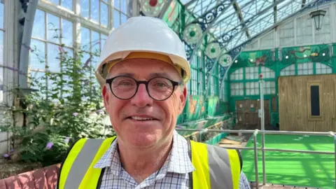 Andrew Turner/BBC Mike Maunder, consultant in horticulture and biodiversity, inside the Winter Gardens