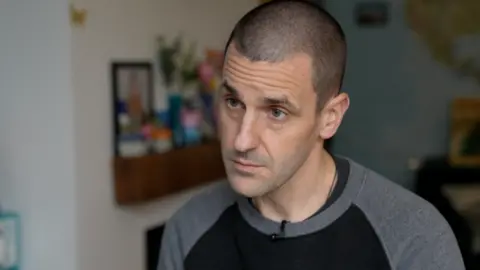 Scott Proudman had external wall insulation fitted to his family's home in 2021