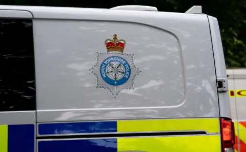 BBC A North Yorkshire Police vehicle with the logo on display 