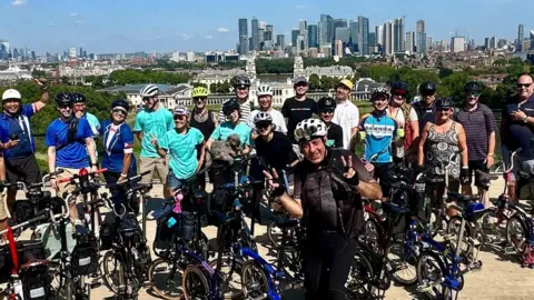 Nico Georgiou Nico Georgiou with other cyclists with London's skyline in the background