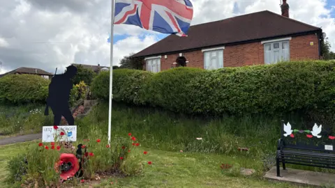 War memorial and bench