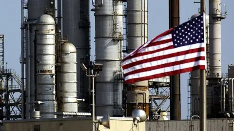 A US flag outside Chevron's oil refinery in Pascagoula, Mississippi