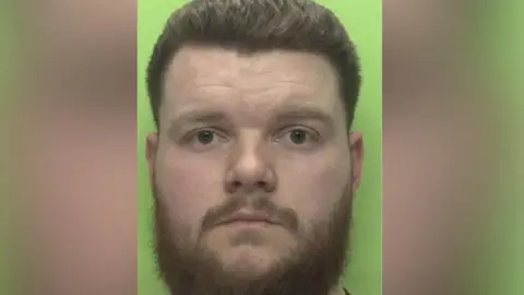 Joshua Snow with a green background