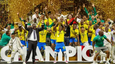Mamelodi Sundowns celebrate with the African Champions League trophy